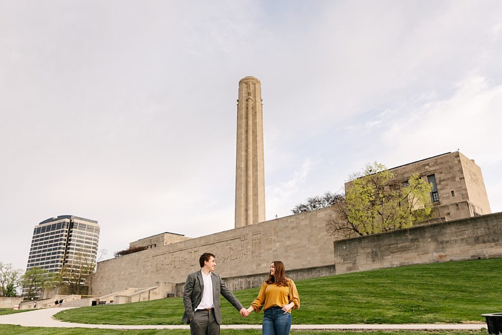Proposal at the WWI memorial in Kansas City, how to propose, when to propose, proposal photographer in kansas city, kansas city engagement photographer, what to wear when you get engaged, should i propose, engagement ring, kansas city skyline, where to propose in kansas city, liberty memorial