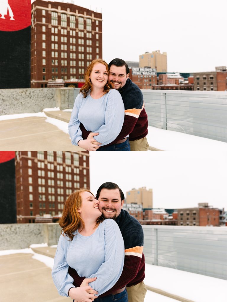 Two image collage of a man wrapping up his fiancé on a rooftop in the snow. 