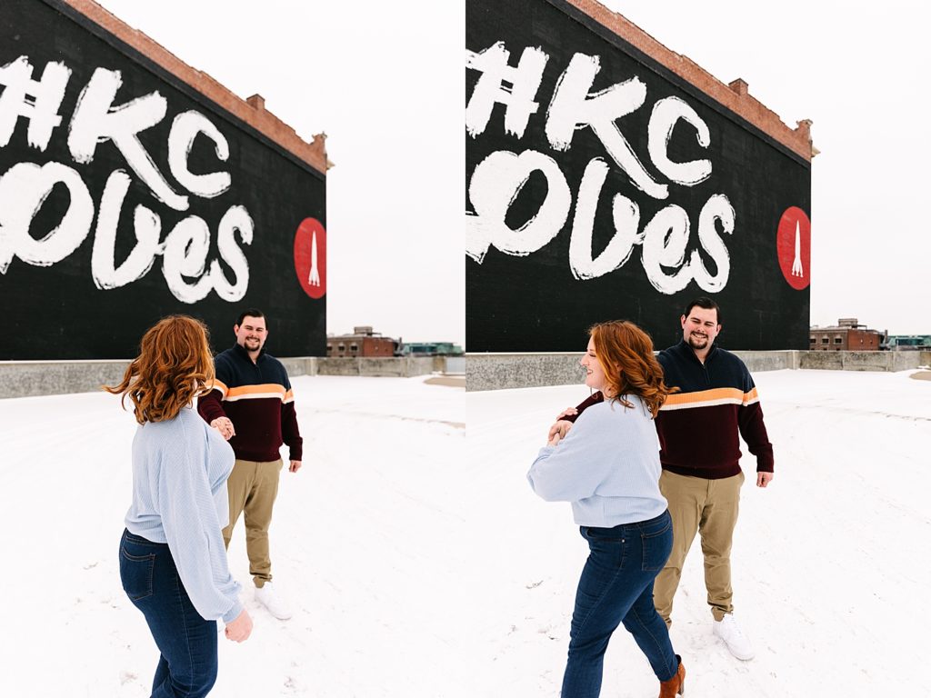 Two image collage of man and woman dancing in the snow in front of the #KC Loves mural. 