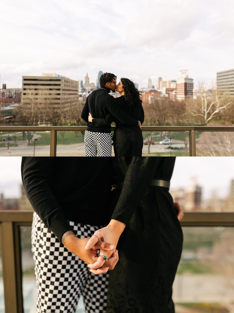 Two image collage on a rooftop kissing. The second image is a detail shot of them holding hands. 