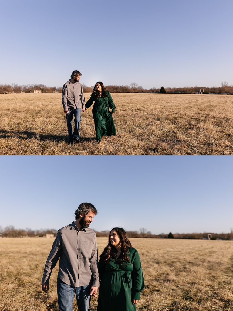 Engaged couple on their own farm land for their Kansas City Engagement session walking across a field. 