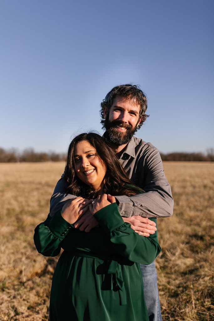 Engaged couple on their own farm land for their Kansas City Engagement session.