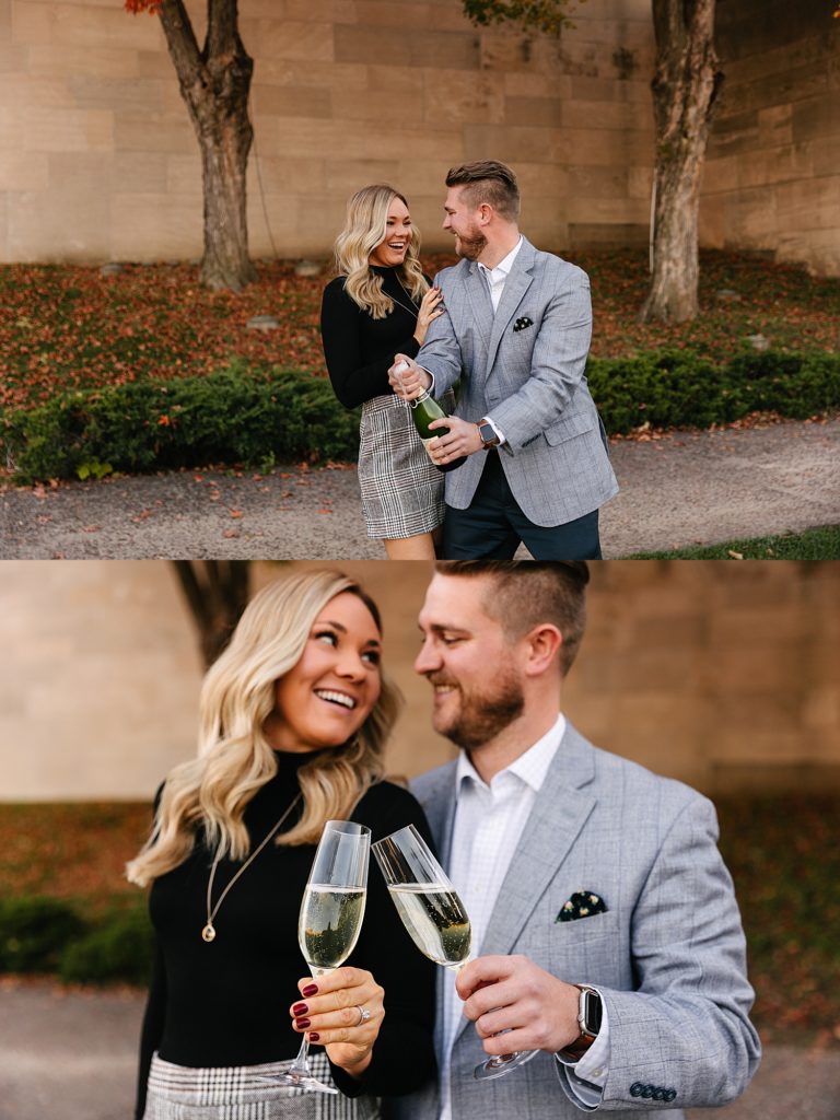 Engaged couple popping champagne at their session with Kansas City Photographer, Natalie Nichole.