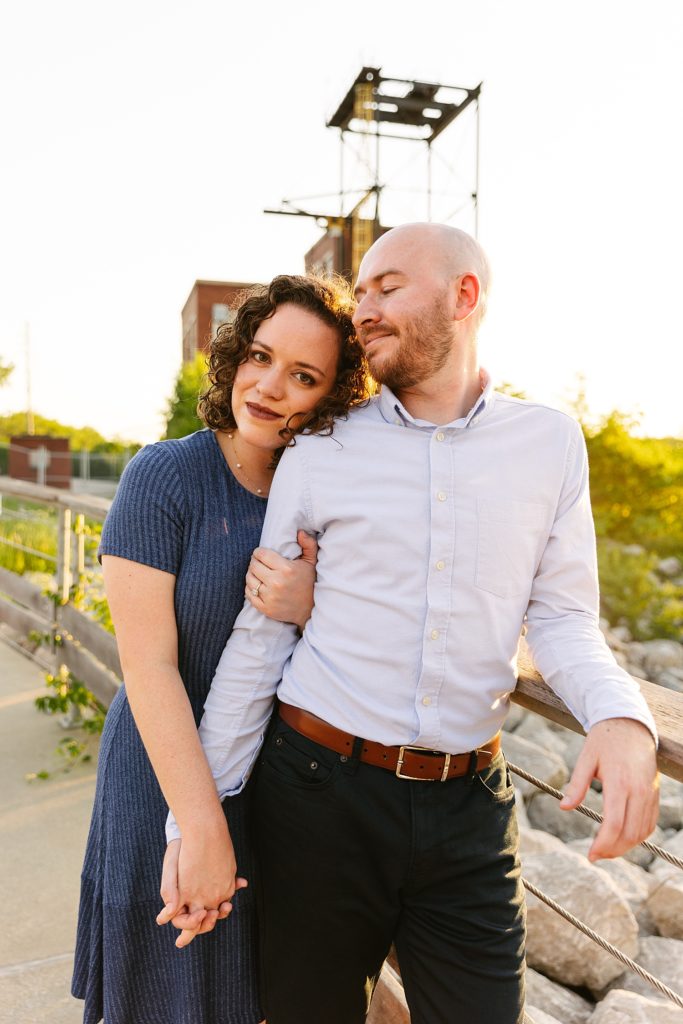 Engaged couple at their Summer engagement session at The Kansas City Riverfront. 
