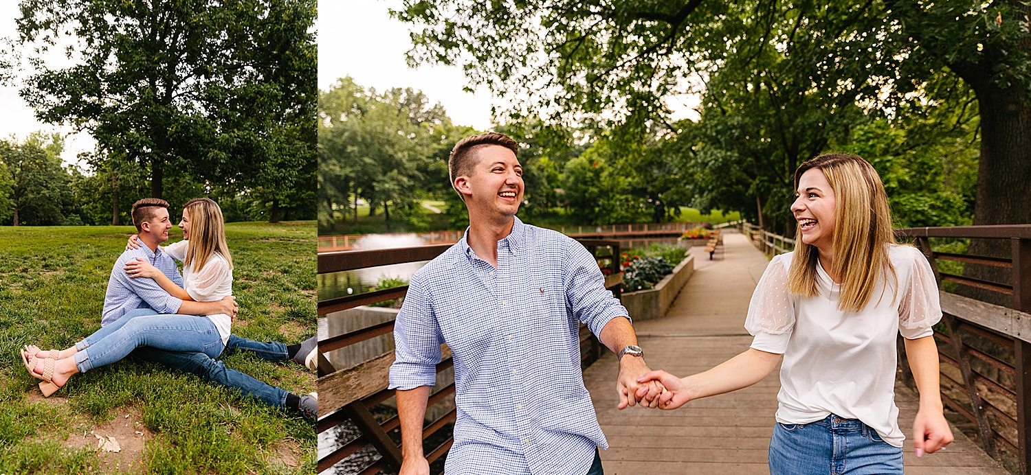 newly engaged couple walking on bridge in park while holding hands and laughing
