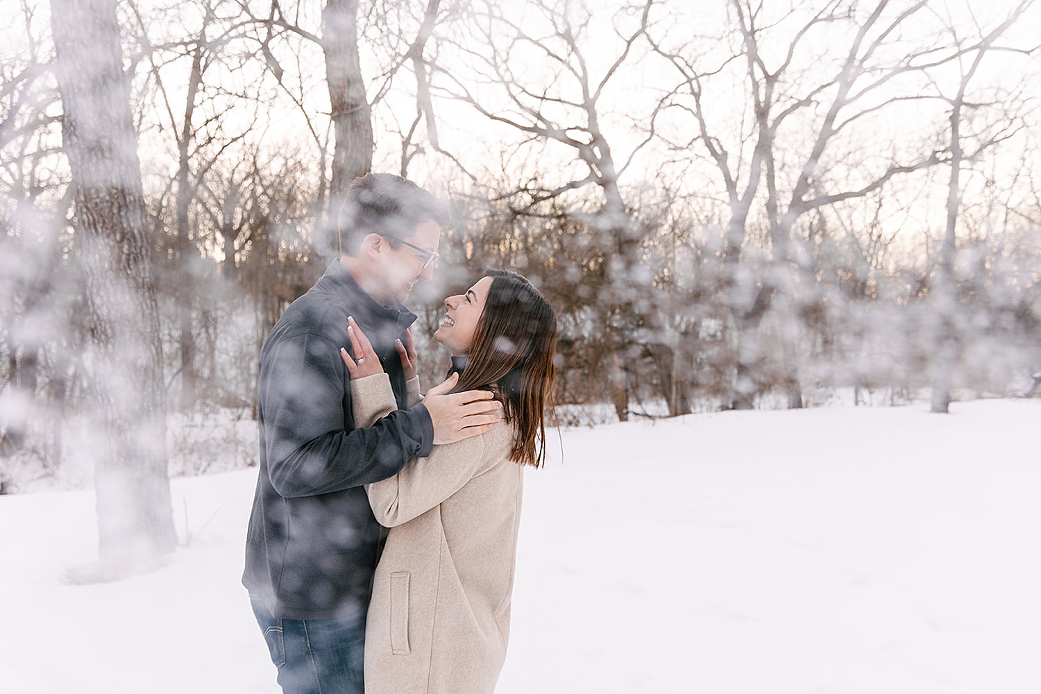 snowy engagement session at shawnee mission park in Kansas City 