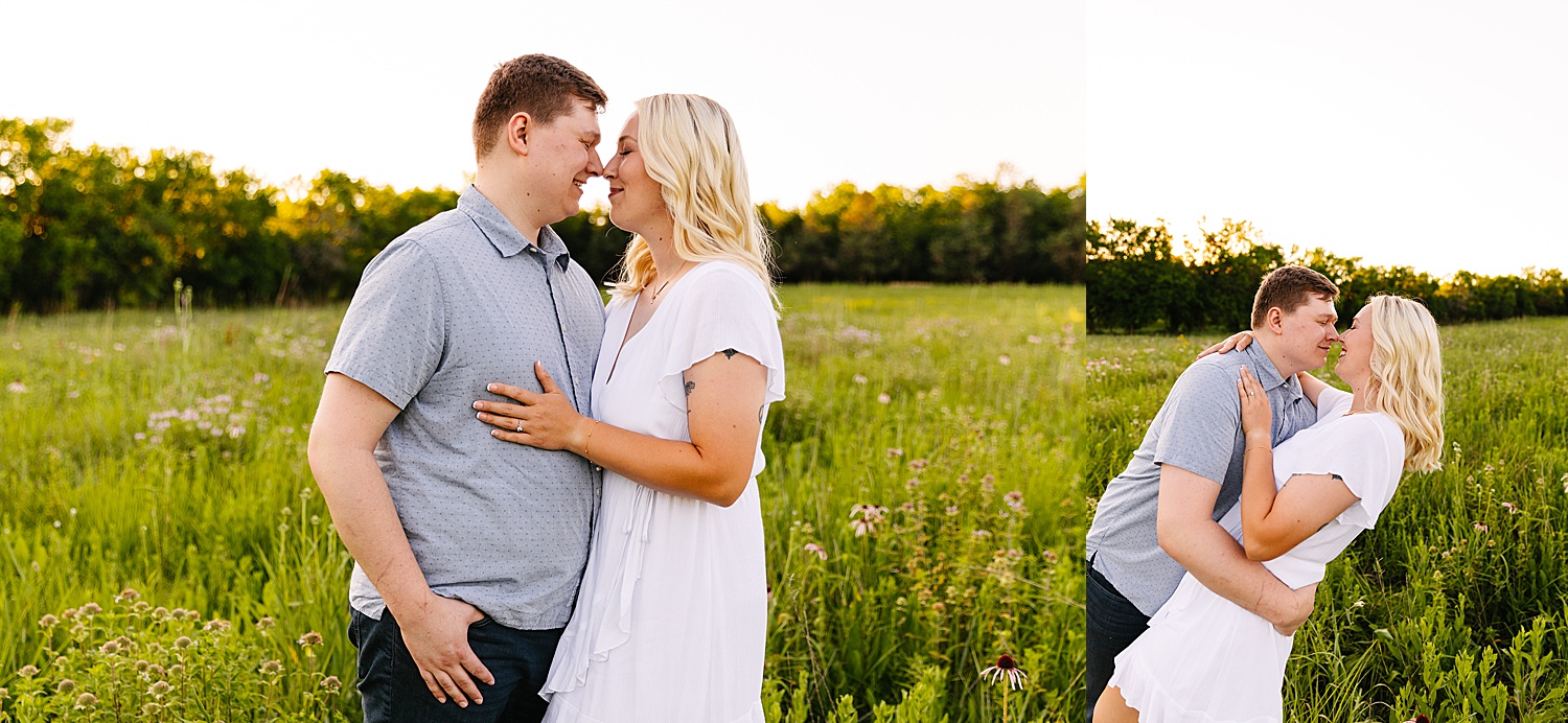 Couple at Shawnee Mission Park engagement session standing in wild flower field in Kansas