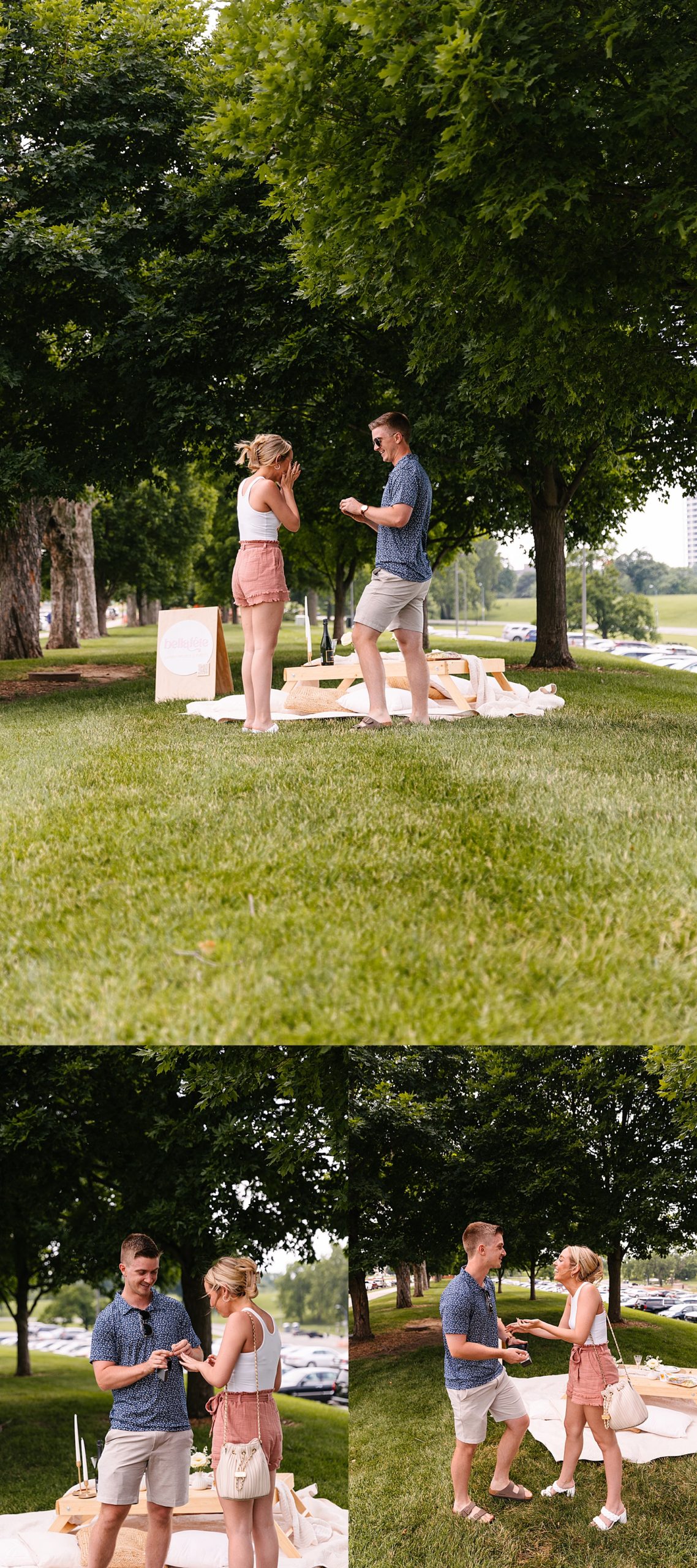 couple laughing in park wearing picnic clothing after getting engaged 