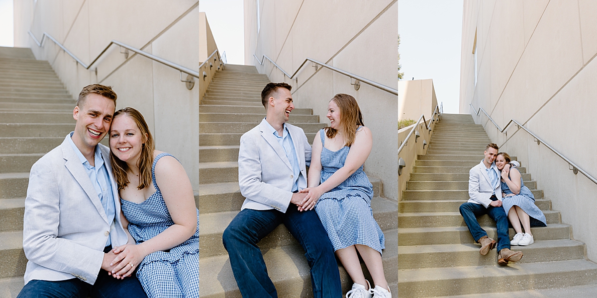newly engaged couple sitting on steps at performing arts center in Kansas City 